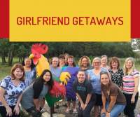 Girlfriend Getaways Group photo around the large rooster.