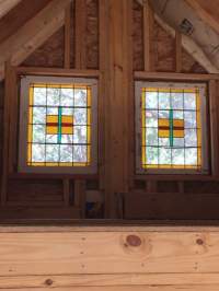 Cross design in stained glass windows