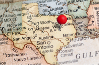 A map of Texas with a red-tip pin on the area of Salado, TX