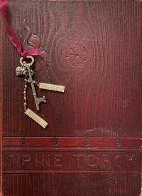 Maroon color 1939 yearbook: The Pine Torch from Wood Junior College. A ribbon book mark has a skeleton key, vintage silver rose ear screw, and heart charm attached.