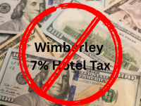American dollar bills with a no symbol on Wimberley 7% hotel tax.